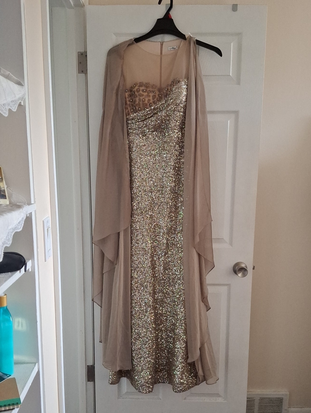Elegant Gold Sequin Strapless Evening Gown with Sheer Taupe Overlay